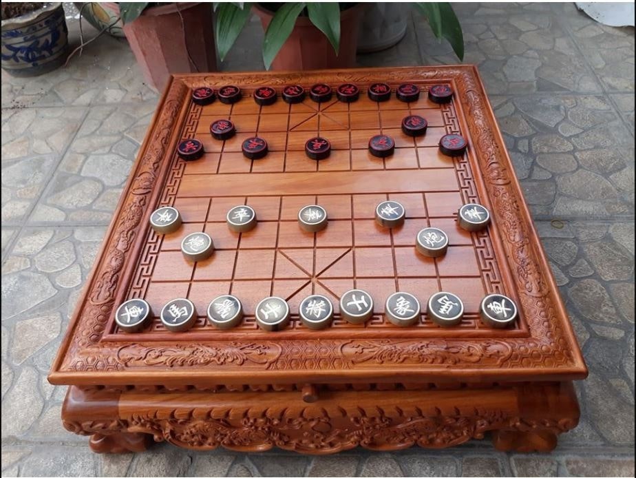 68gamebai company Nguyên tắc chơi cờ tướng cuối cùng là không dồn quân sang một bên